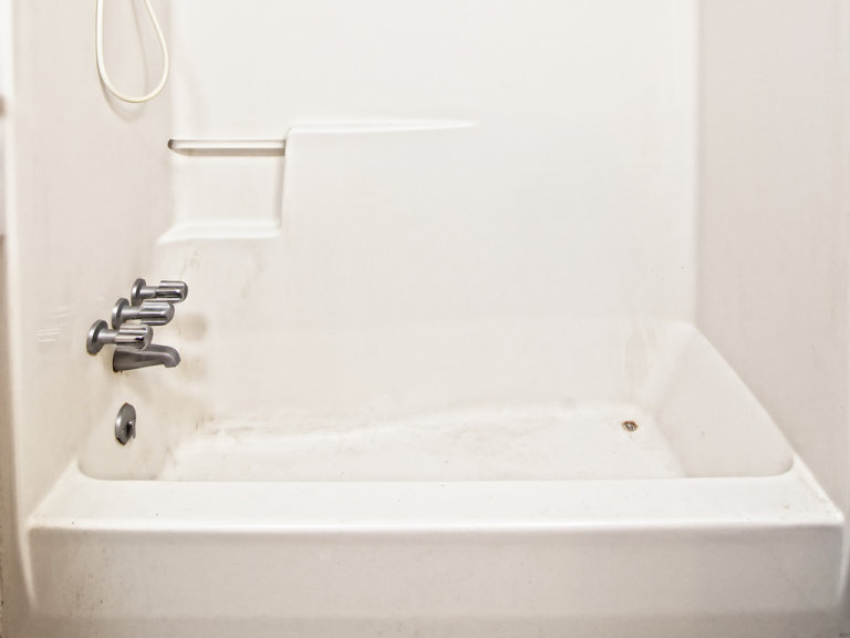 old fiberglass bath and shower combo